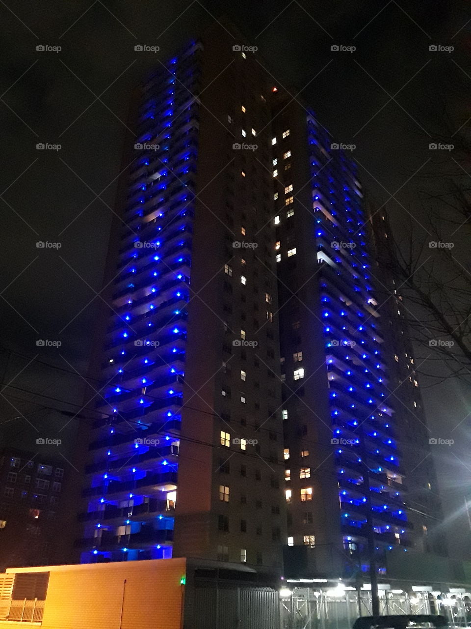 A residential building lights up beautifully  at night. Forest Hills- Queens New York