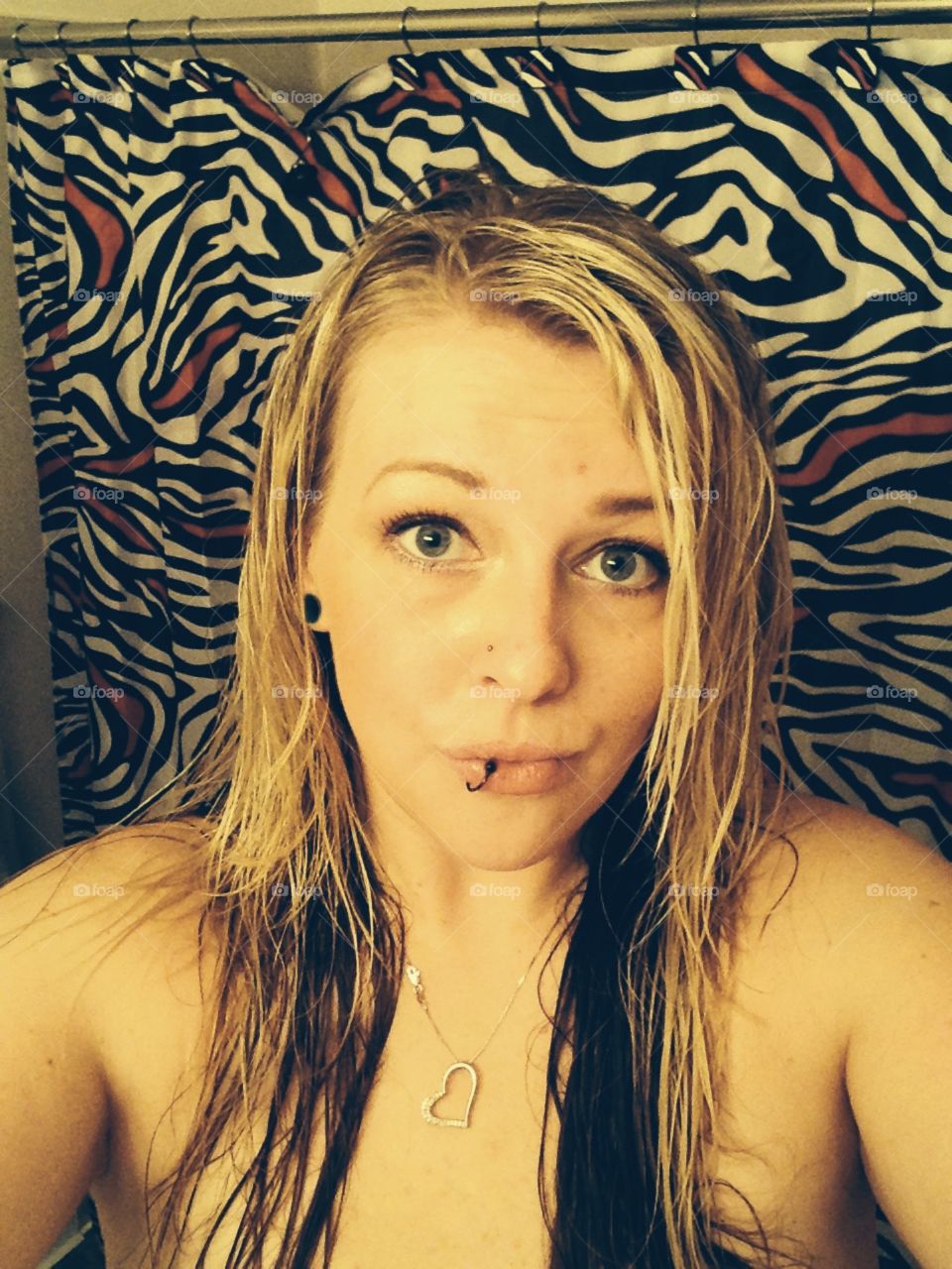 Cute kissy face with zebra stripe behind. 