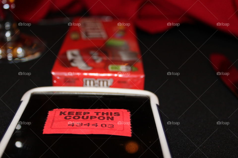 Red raffle ticket candy box cell phone
