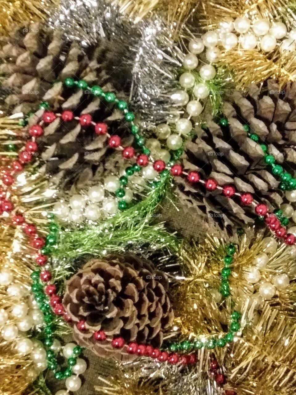pinecones with holiday decorations