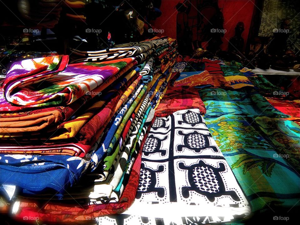 Multi colored clothes in market