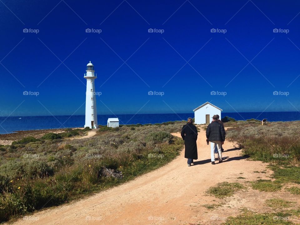 Lighthouse, south Australia. People walking toward south Australia lighthouse