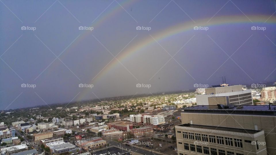 Double rainbow. Denver, colorado, rainbow, downtown, storm, pretty, rainbows, storming, storm day.