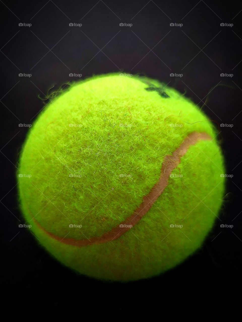 Happiness.  Smiling tennis ball.  Smiling is the main emotion of happiness