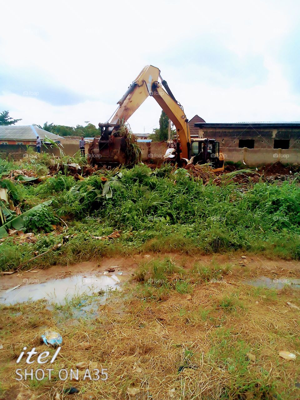 tractor digging trainage