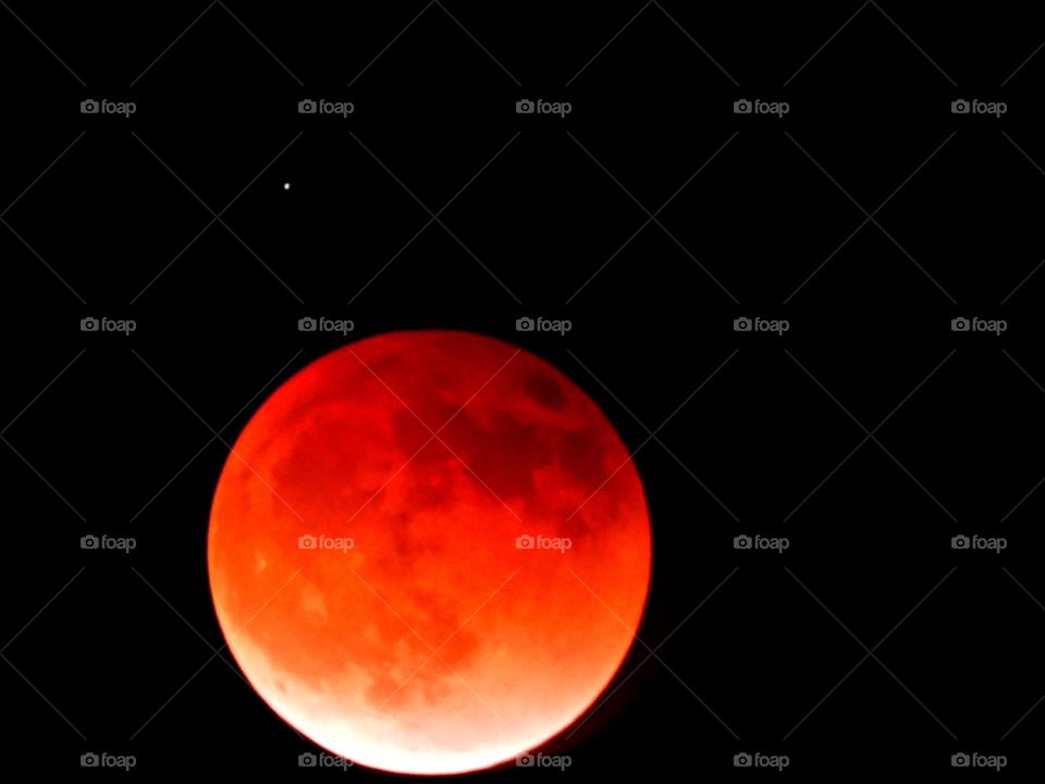 My photos of the Blood Moon, Total lunar eclipse on 15 May 2022 - Lunar eclipses occur when Earth aligns between the sun and the moon and casts a shadow across the lunar surface. The weather condition were very cloudy
