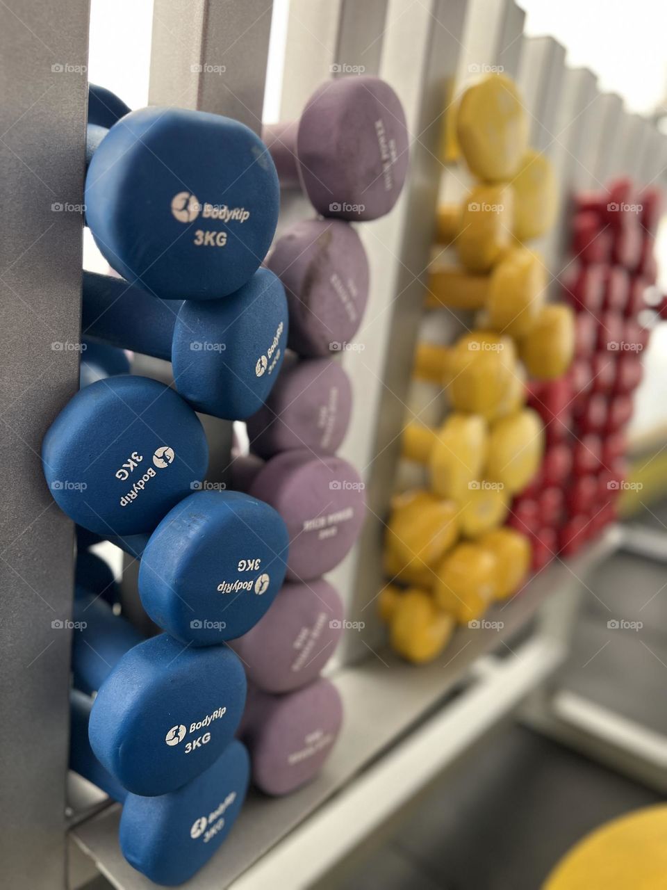 Coloured dumbbells weights