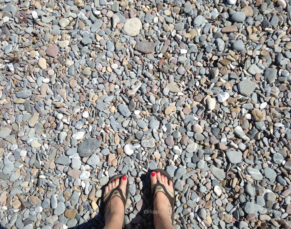 Standing on the rocky beach of Gaspé