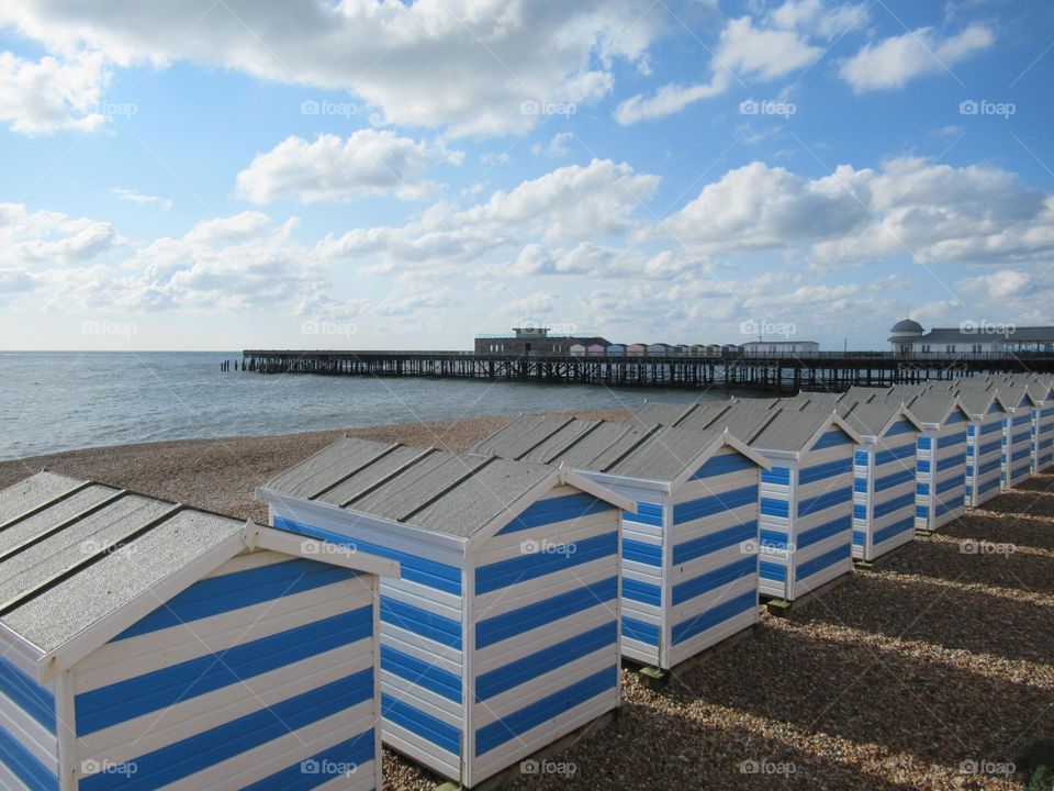 striped blue and white beach huts