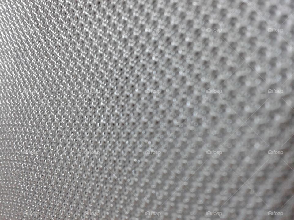 this is a macro of my television speaker that can be used as a wallpaper