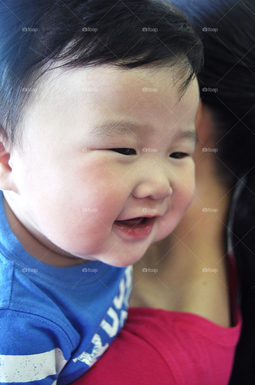 Close-up of a little asian boy