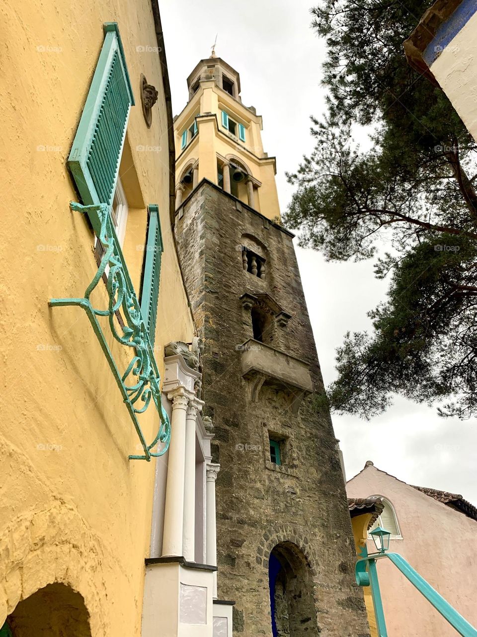 Ground floor view of architecture tower and buildings in mock Italian style Wales