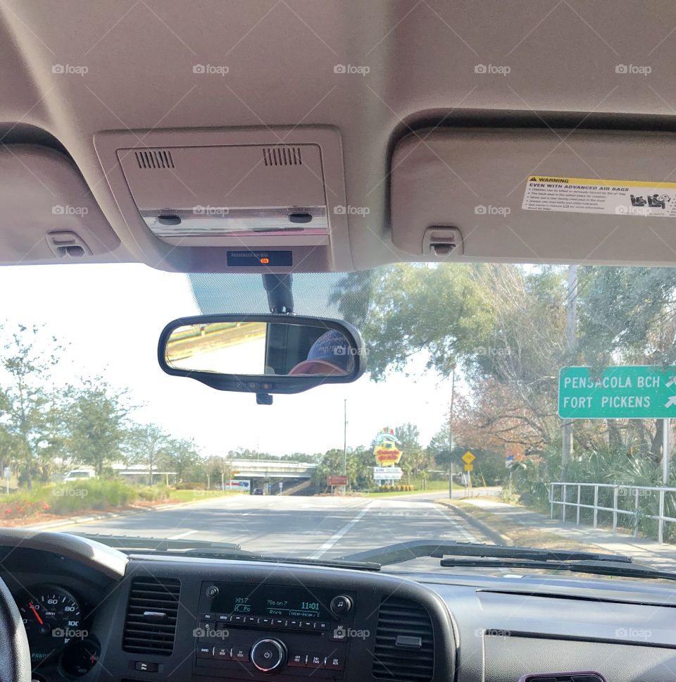 Road sign for Pensacola Beach and Fort Pickens 