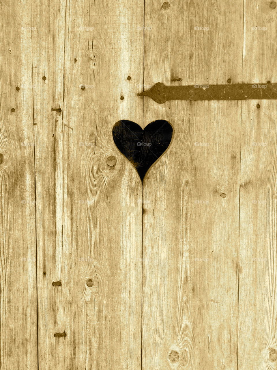 Heart shape on wooden surface