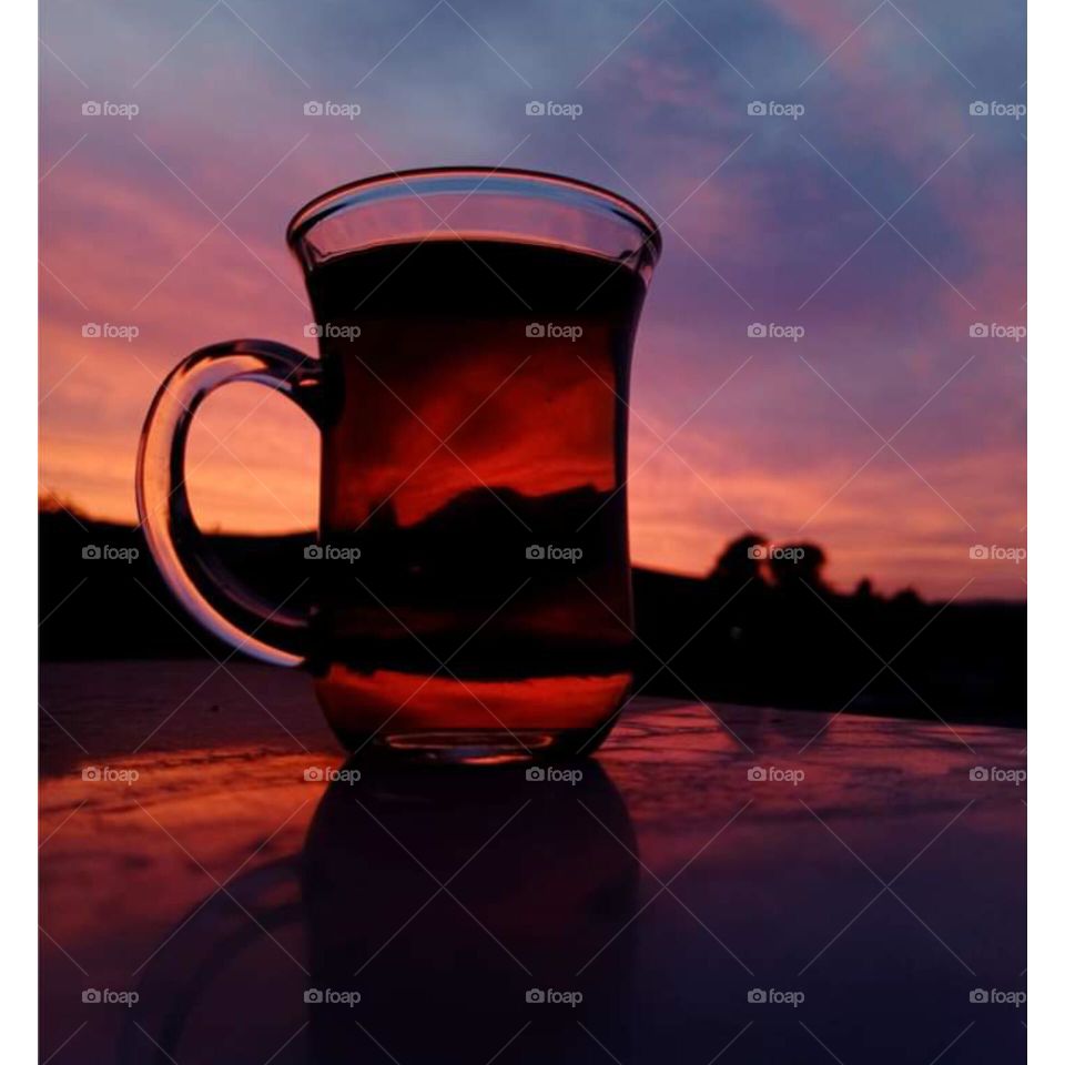 How beautiful it is to sip a cup of tea at sunset while contemplating the red twilight