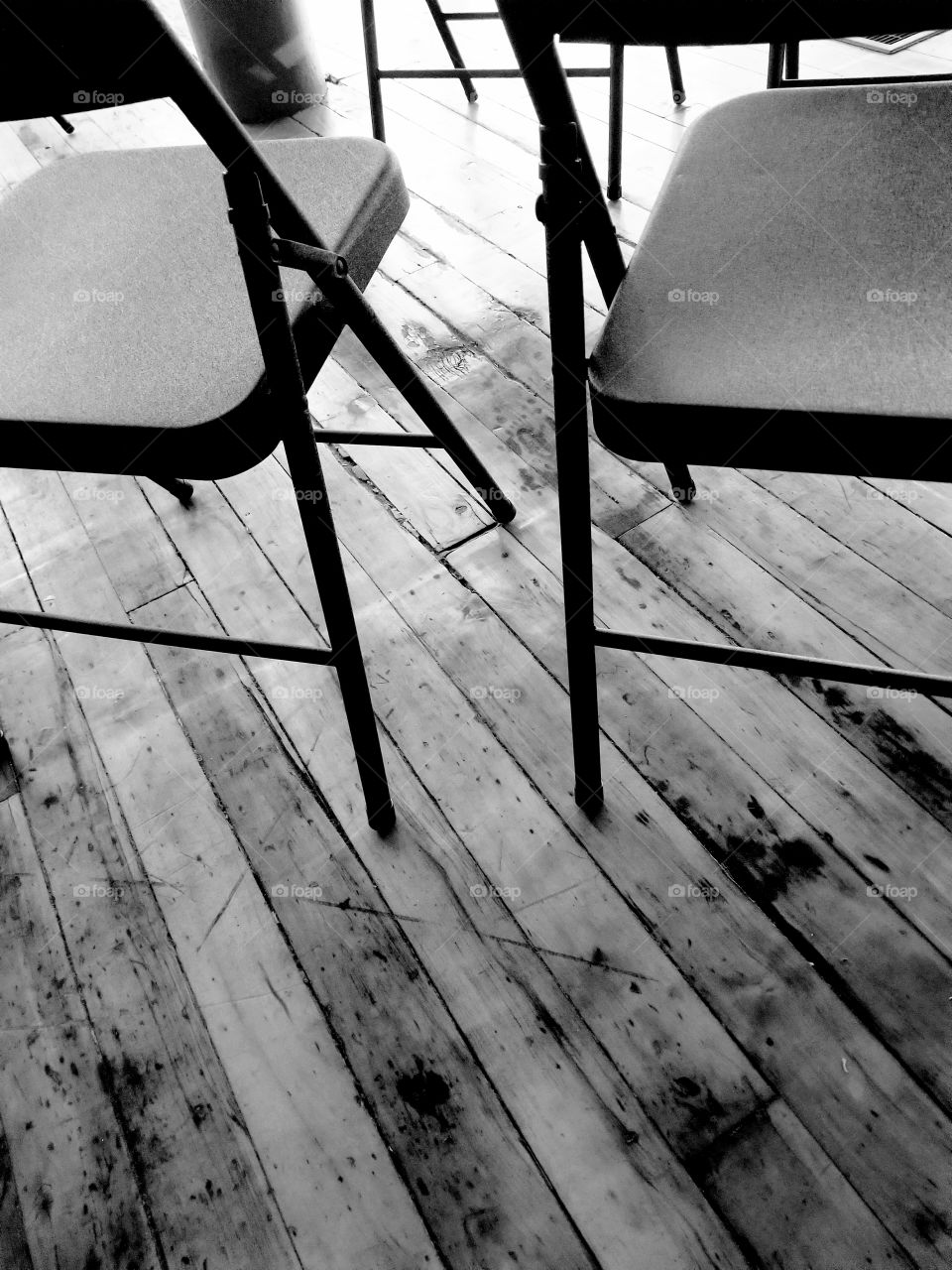 Chairs on a well worn floor