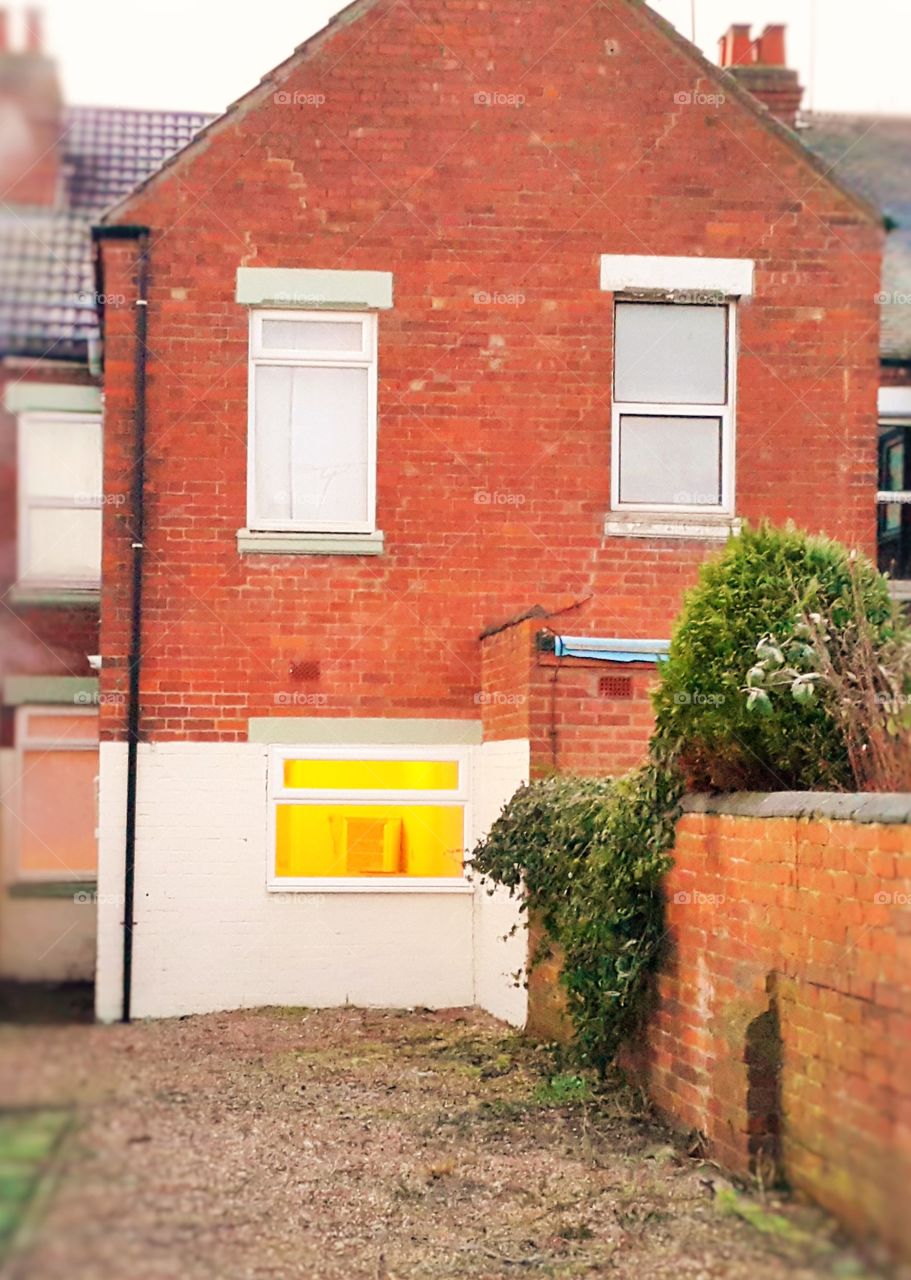 Grinning House - Bright yellow rectangular smile!