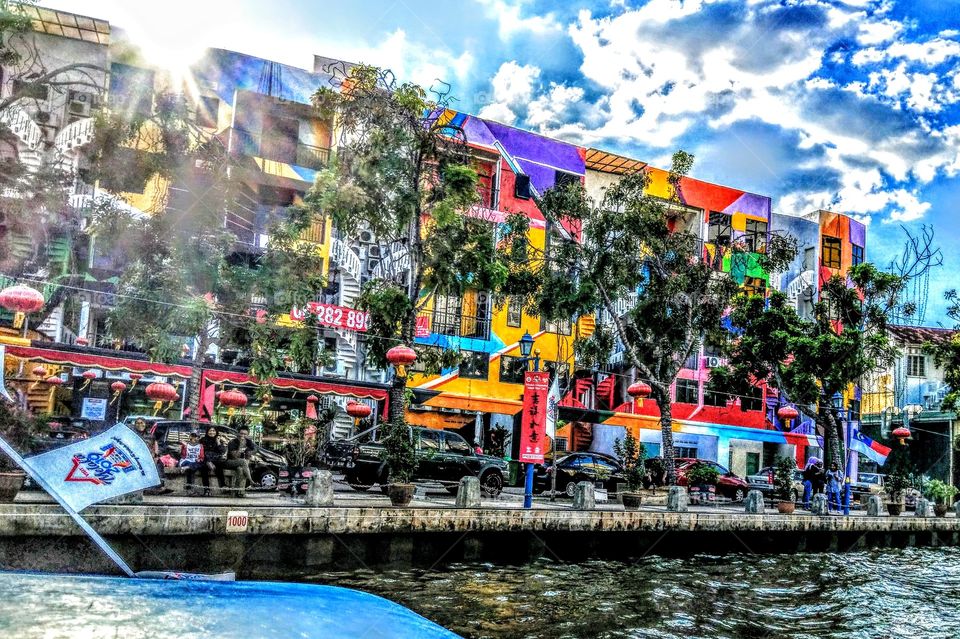 The colorful and bright architecture in Maleka Canal, Malaysia. old buildings but beautiful, a historical canal. also had river reflection.