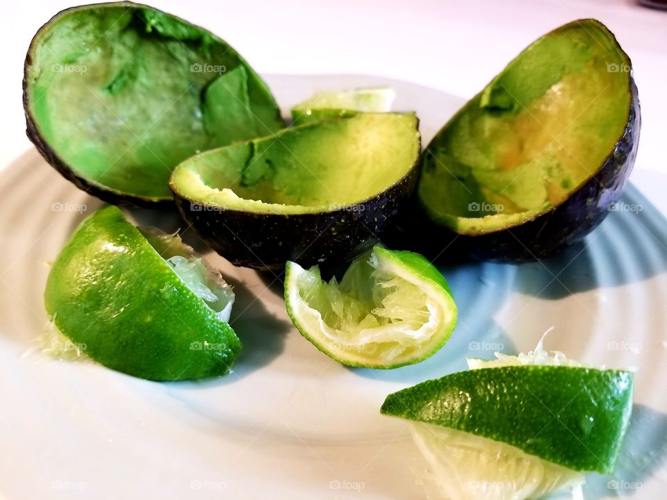 Avocados and limes, all set and ready to make guacamole. so delicious.