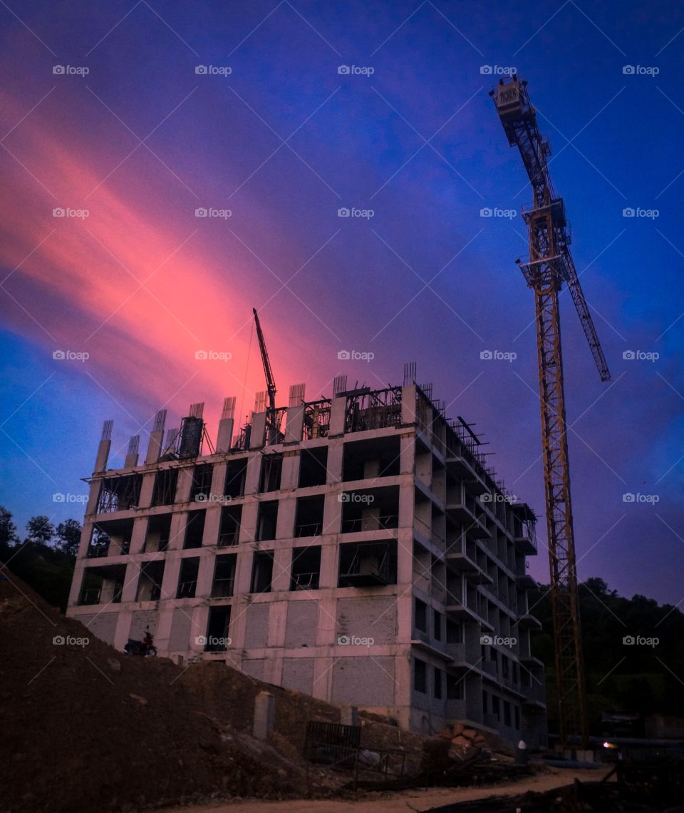 Construction site look like abandon building when dark sunset