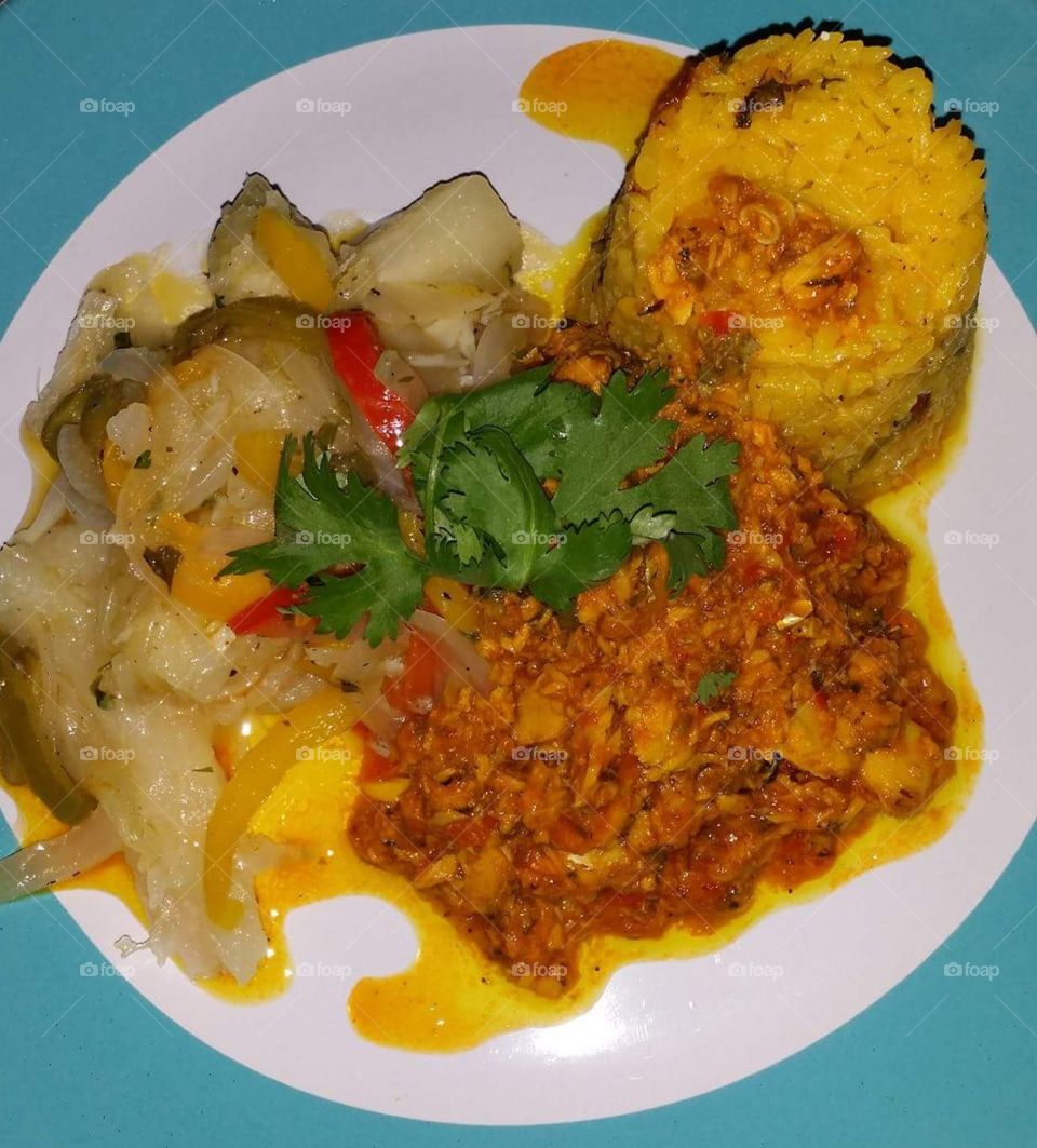 Salmon Stew, Yucca with Sauteed Onios and Yellow Rice. Yummy!! By Chef Alex...