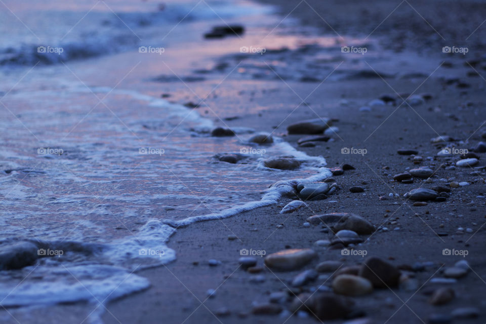 rocks on beach. rocks on beach at sunset