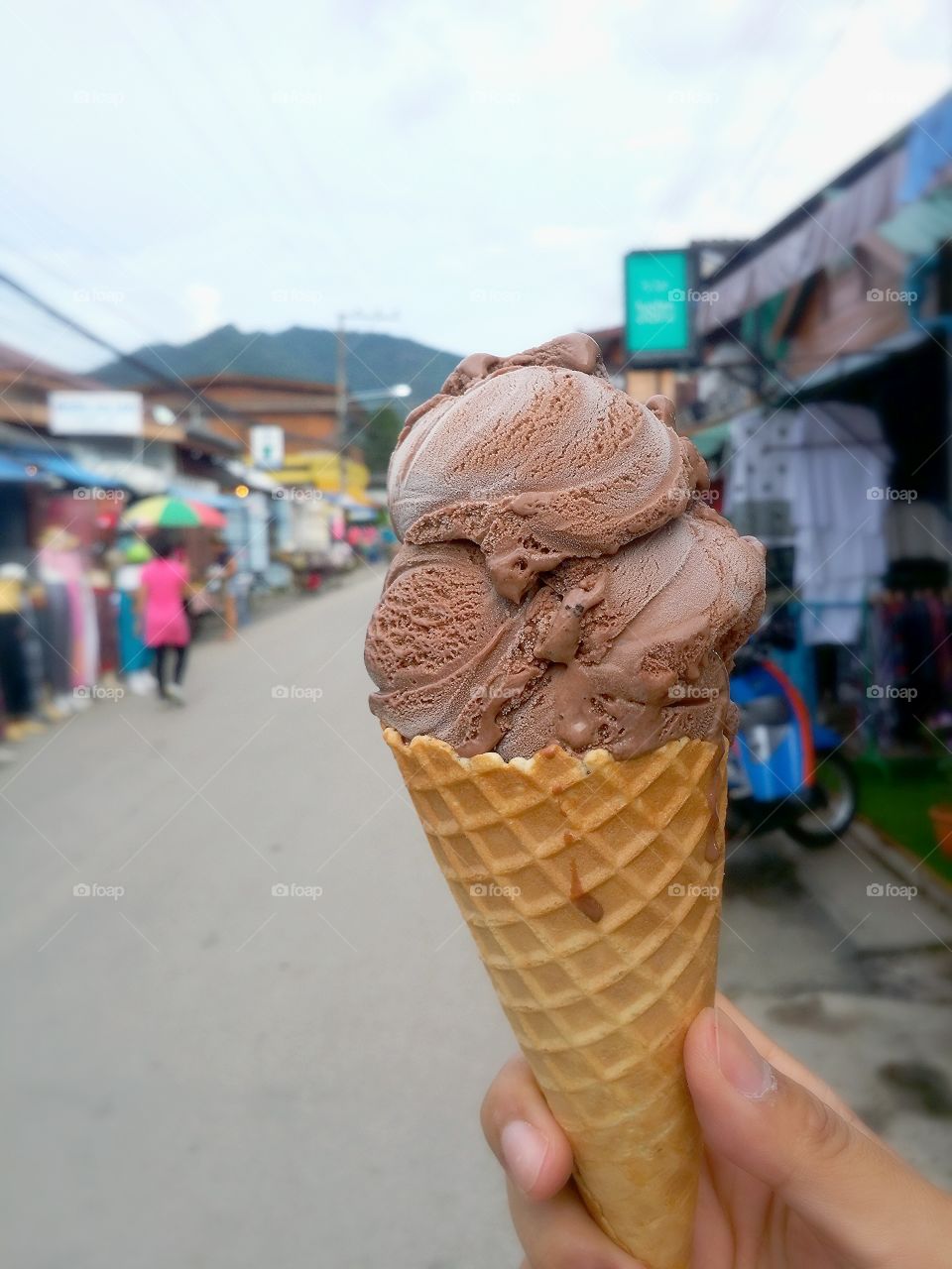 Travel in Pai walking street.. Travel in Pai walking street at Maehongson Thailand with Chocolate Ice Cream.