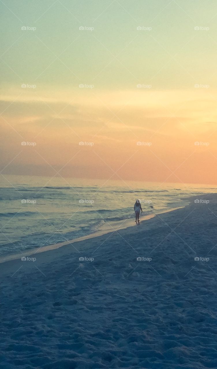 Sunset walk on the beach 