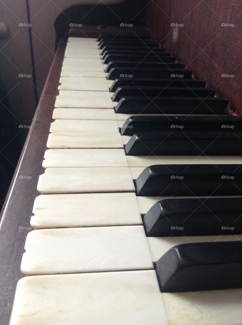Antique piano with real ivory keys.