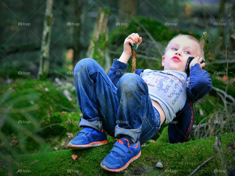 Boy calling home