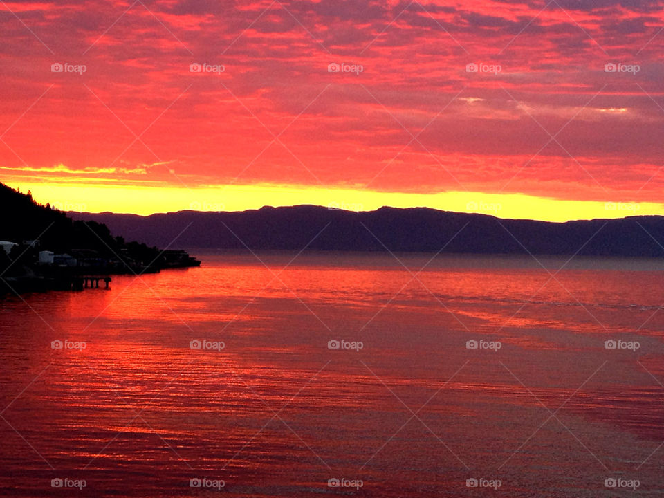 sunset sea mountains view by kaasarod