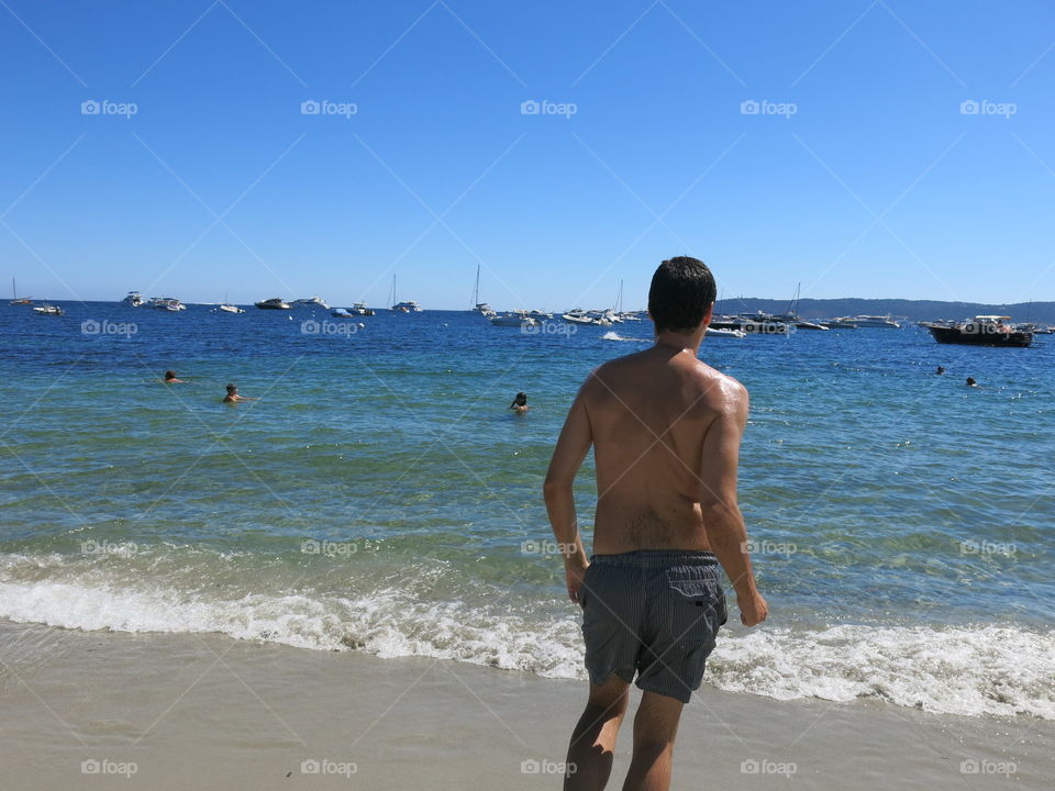 Man runs into the Mediterranean Sea off the coast of southern France. 
