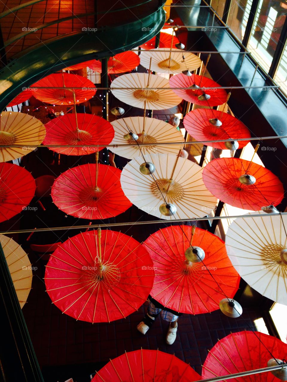 Umbrellas . Aerial view of a sushi bar from an eclectic shopping mall. 