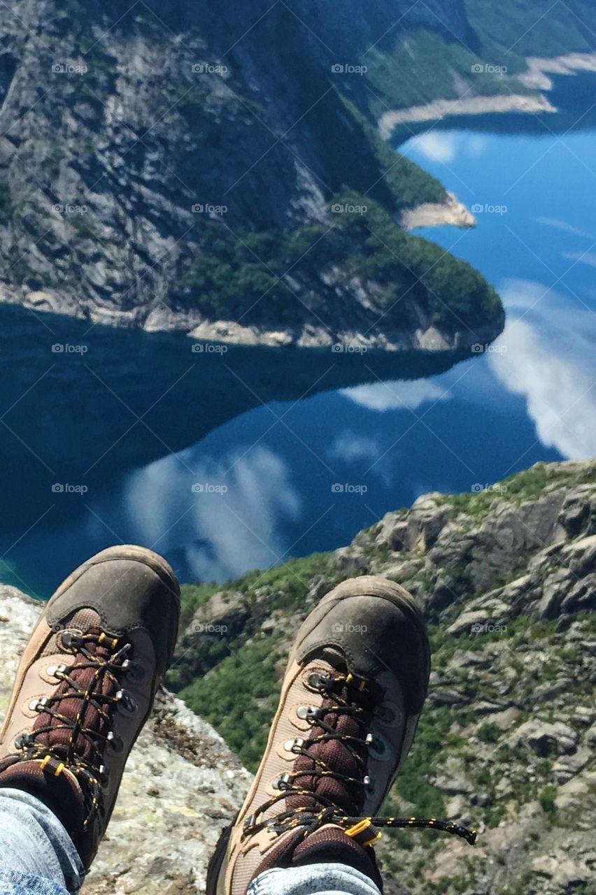 Hiking boots above the lake 