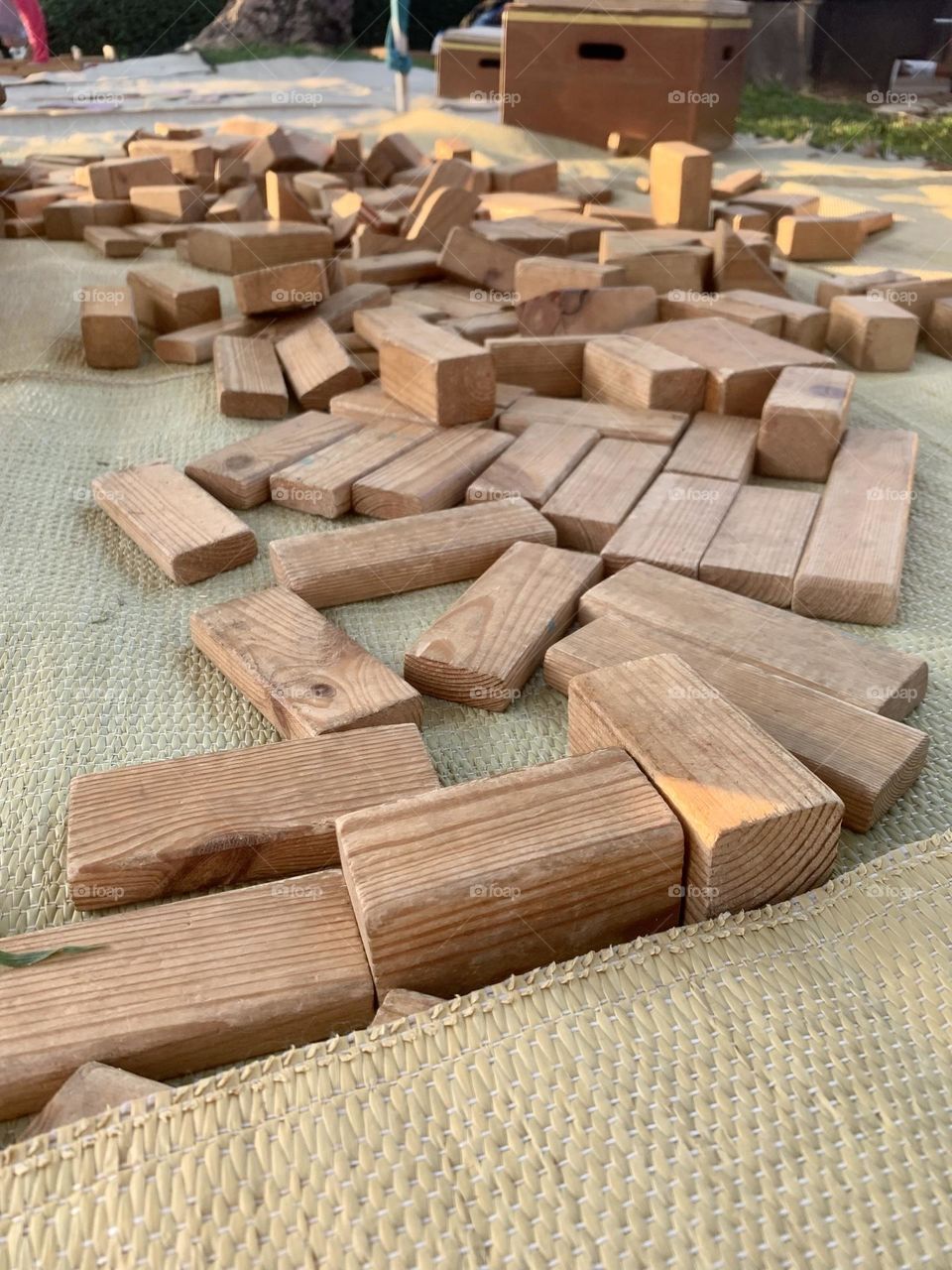 Many wooden blocks on a carpet