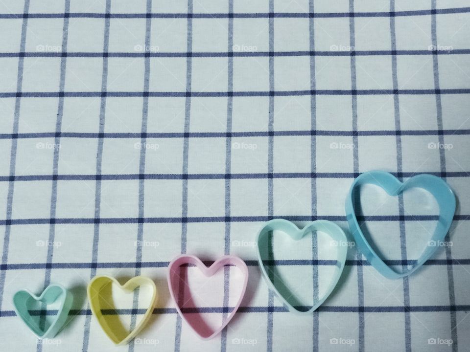 colorful heart shape on bluey white background