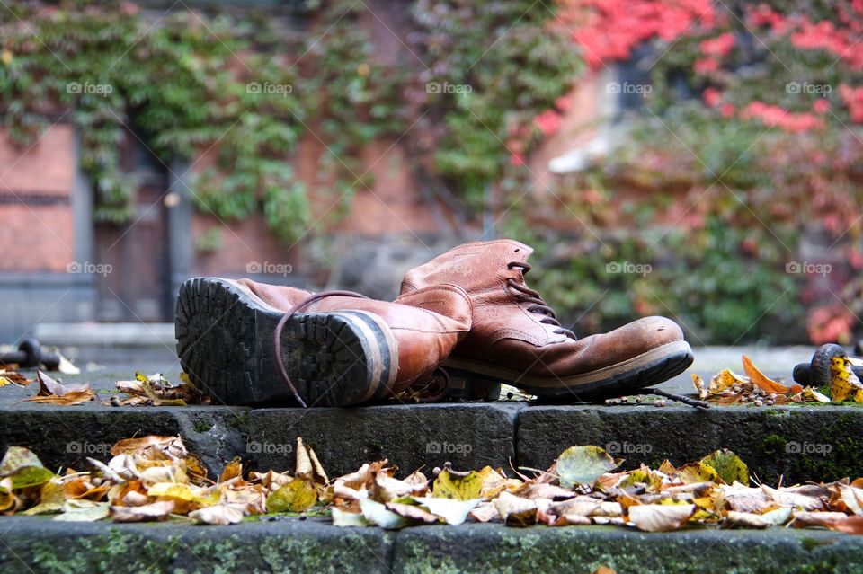 Boots and autumn background