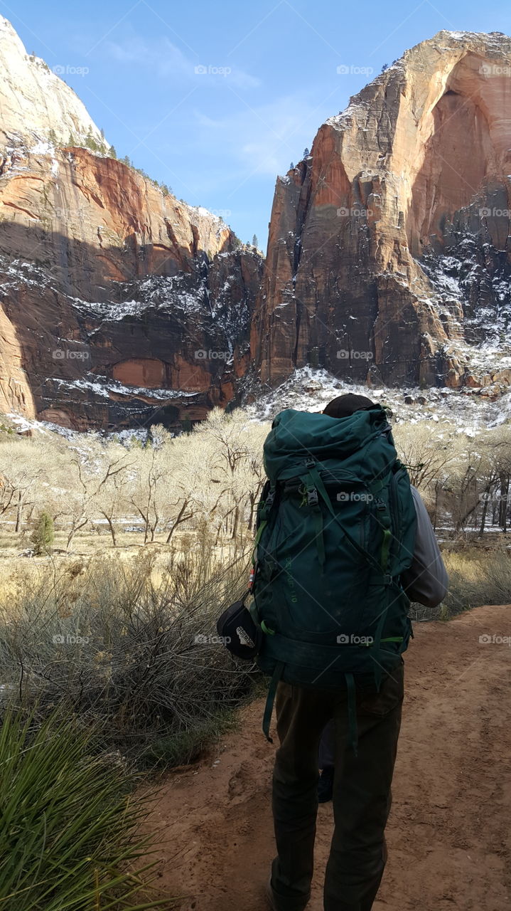 Taken at Zion National Park.  The National Park Ranger, Murray, is hiking back to employee base camp after working in Zion National Park's interior where he made sure the park and trails are safe for the many of visitors to the National Park.
