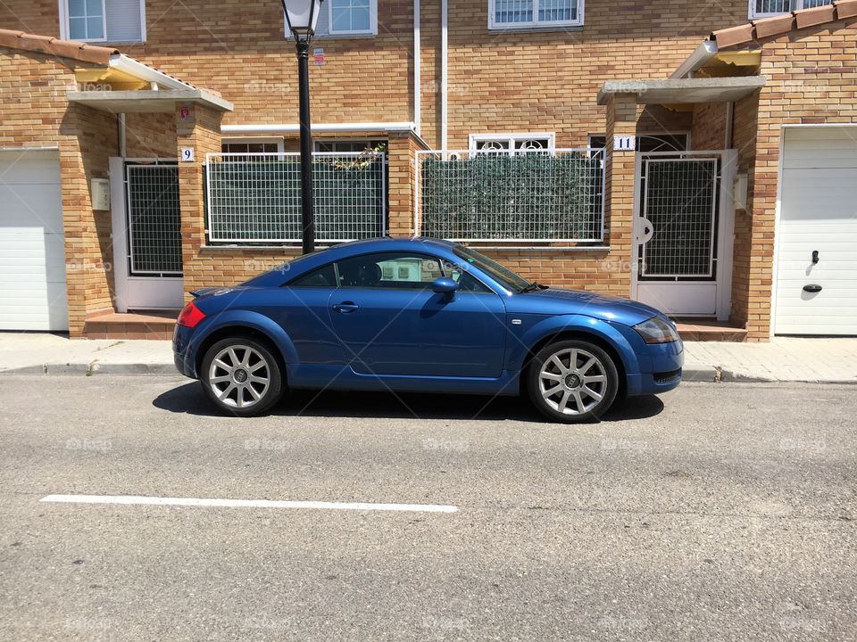 Audi TT parked outside in the street