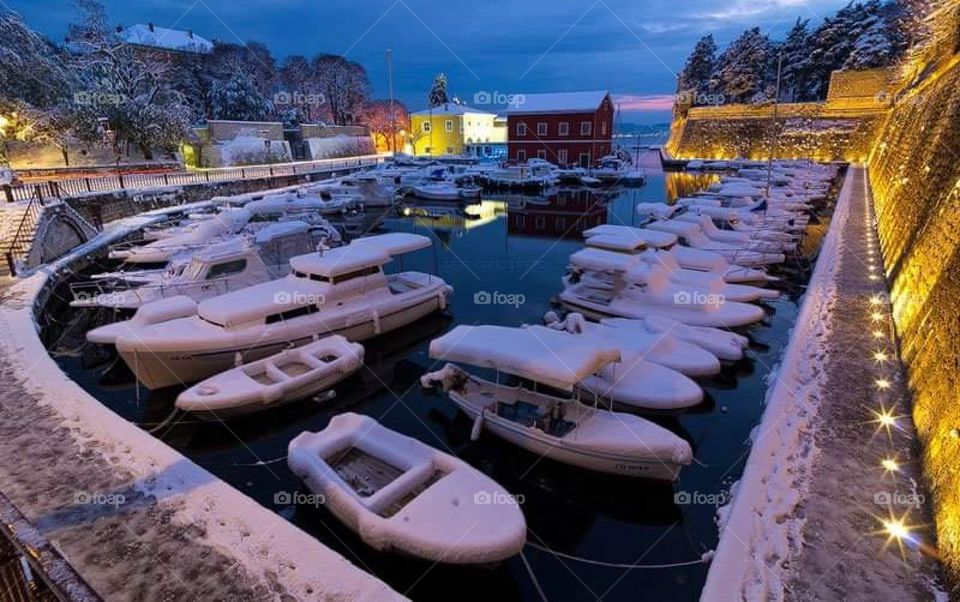 Zadar city in the snow evening