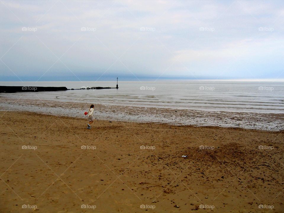 Child playing on beach 3