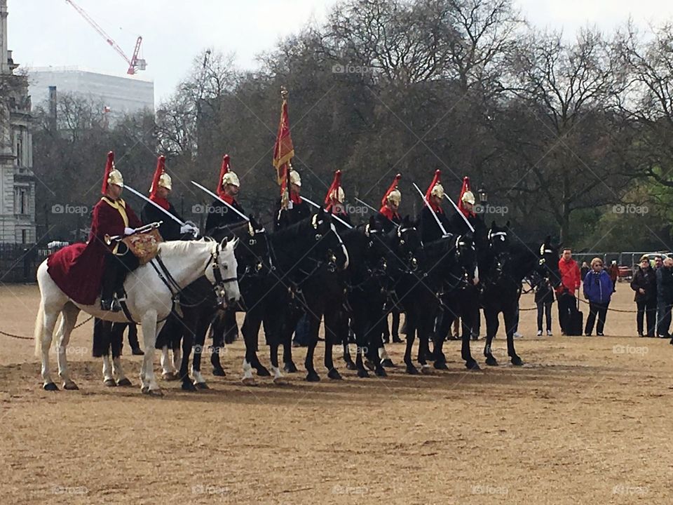 LONDON ENGLAND 23RD MARCH 2017 HORSE GUARD PARADE , FOLLOWING THE ISIS ATTACK ON WESTMINSTER BRIDGE AND THE HOUSES OF PARLIAMENT ON 22ND MARCH 2017 UNIFORMED SOLDIERS PERFORM ON HORSE BACK 23RD MARCH 2017.