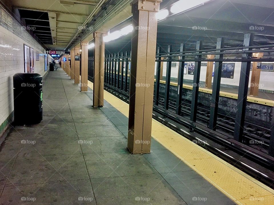 A nearly completely empty subway station in Long Island City, Queens, New York. 2021. Hypnotic Productions