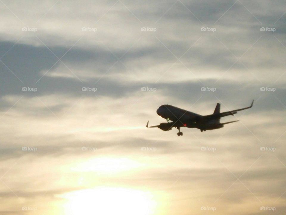 beautiful airplane flying cross the sky.