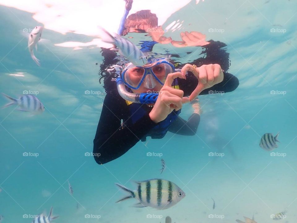 My first snorkeling 🐟🐠
After a bit practice. Do you see my heart? 
it comes up because I love something down there. Guess what ? 🐟🐠🐡🦈🐬🐋🐳 💙 💚