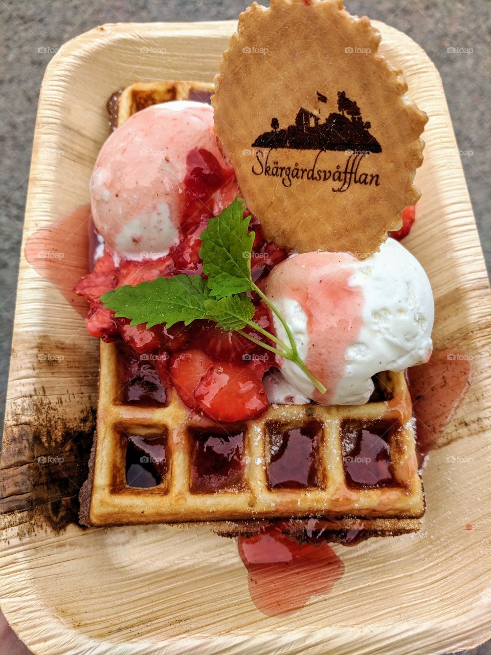 Waffle with ice cream and strawberries