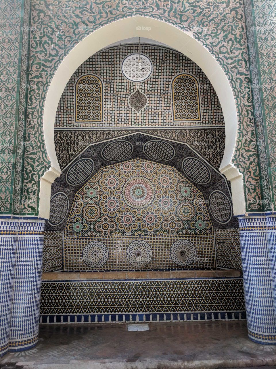 Beautiful Blue, Green, Orange, Yellow, and Off White Ceramic Mosaic Double Arch (Entrance/Entry Way) in the Old Medina in the City of Fez (Fes) in Morocco