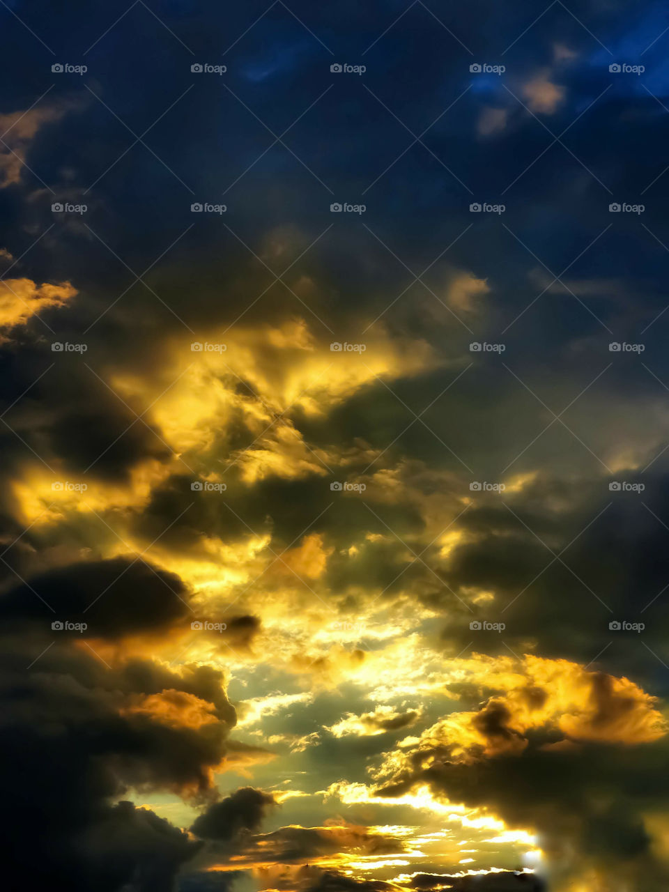 Sunset Opening Through The Storm Clouds