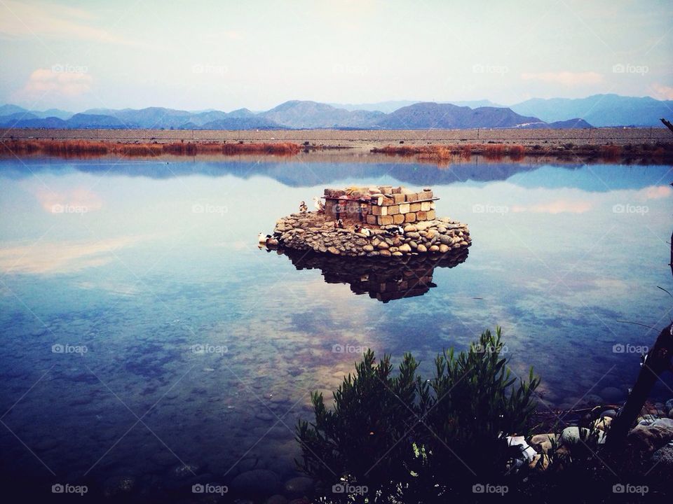 Clouds reflecting in sea
