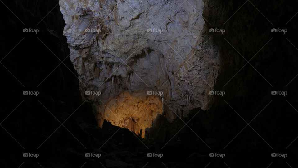 A dark cave in Romanian mountains